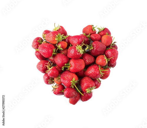 Heart shape strawberries on white background. Strawberries isolated on white background. Ripe berries close-up. Top view. Background of red berries. Background of fresh strawberries. 