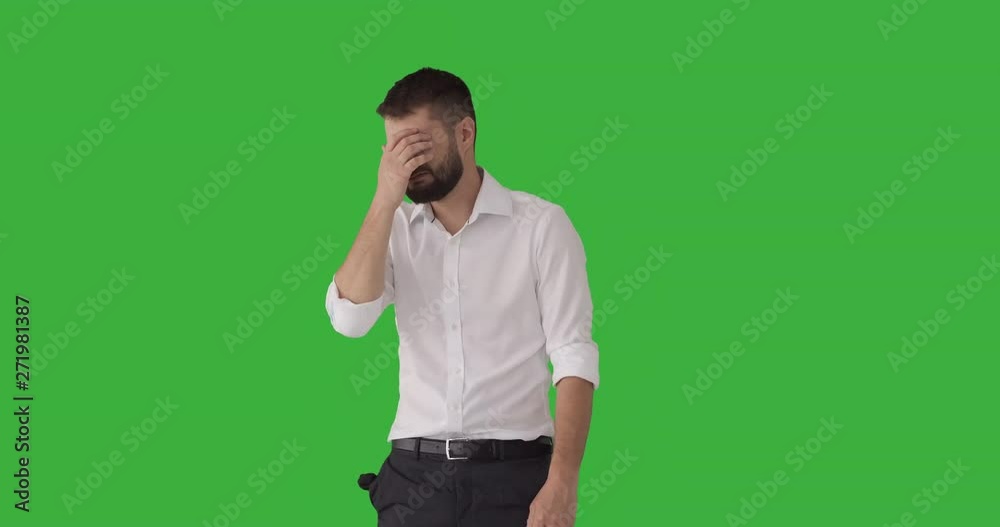 Penniless businessman crying and coming up with brilliant positive idea while pointing over copy space Penniless businessman crying and coming up with brilliant positive idea while pointing over copy space
