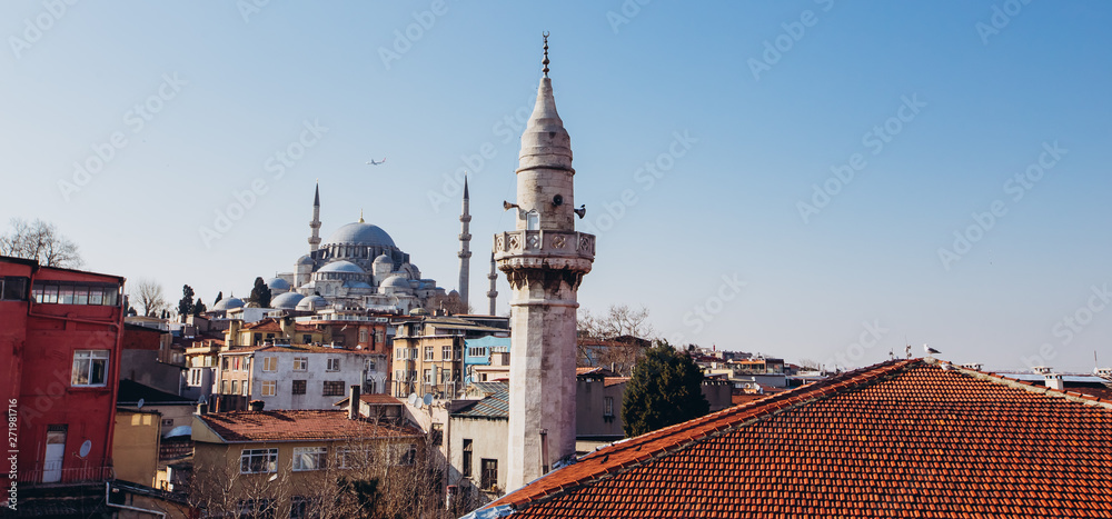 The roof of the Grand Bazaar, Suleymaniye Mosque in Istanbul, Turkey. View of the mosque with minarets.