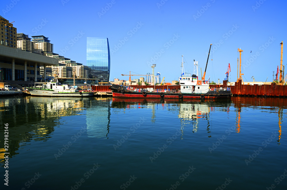 Pier boats and yachts on the shore of the Caspian Sea in Baku.Baku port