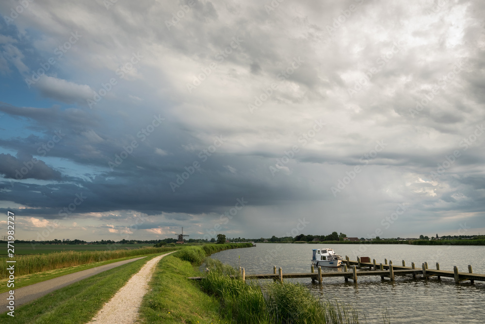 Thunderstorm over the dutch landscape near the river Rotte. 