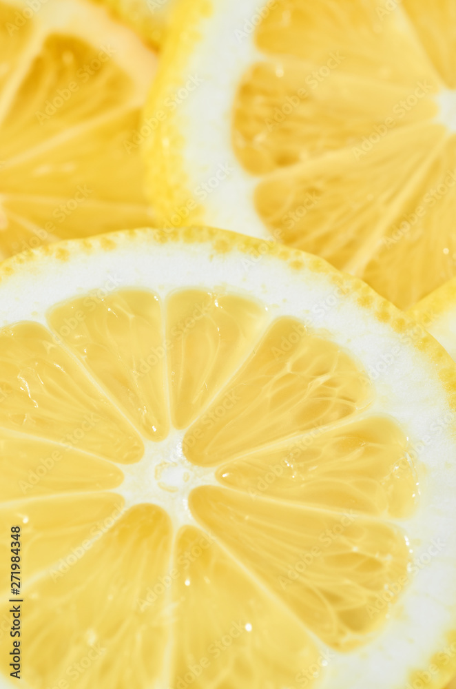 background of heap fresh yellow lemon slices. pattern for your design background of heap fresh yellow lemon slices. pattern for your design