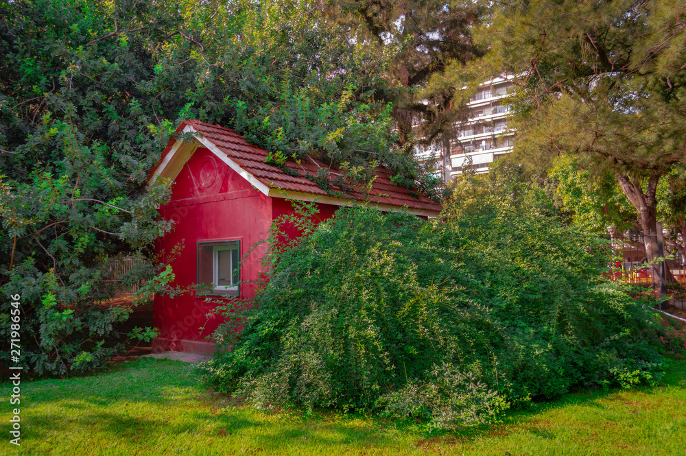 Red Wooden house on the forest Red Wooden house on the forest