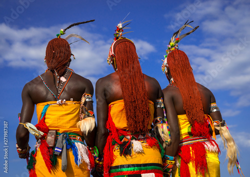 Rendille warriors with long braided hair, Turkana lake, Loiyangalani, Kenya photo