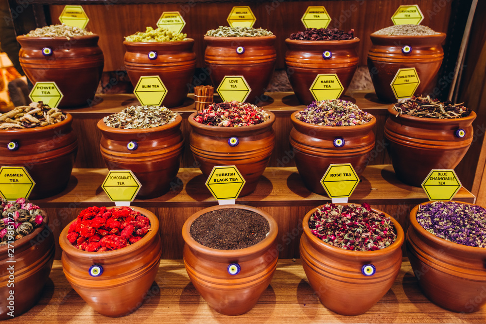 Fototapeta premium A variety of culinary seasonings in the eastern market. Bright and colorful tea shelves from the Grand Bazaar