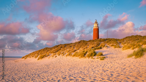 Lighthouse texel Island Netherlands, Lighthouse during sunset on the Island of Texel photo