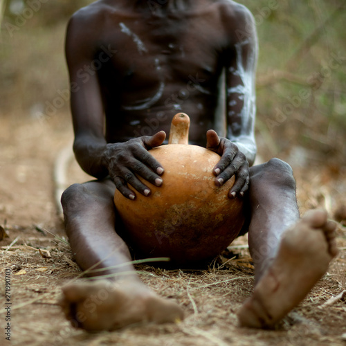 Tharaka tribe man drinking in a calabash, Kenya photo