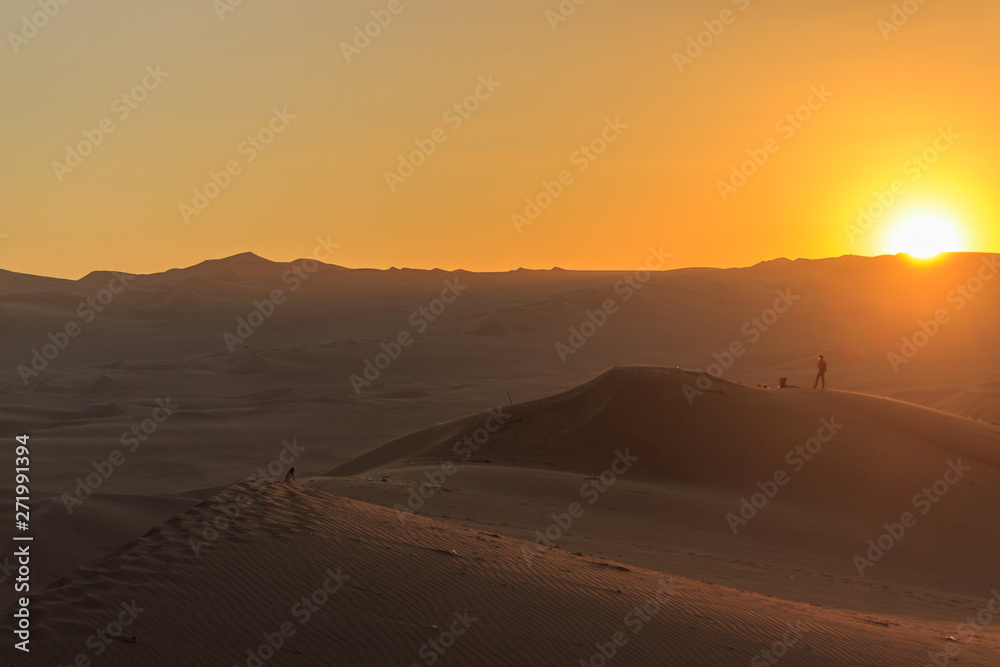 sunset at huacachina desert oasis in peru sunset at huacachina desert oasis in peru