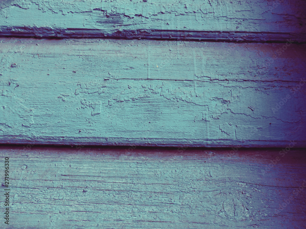 wooden wall consisting of three boards covered with turquoise paint wooden wall consisting of three boards covered with turquoise paint