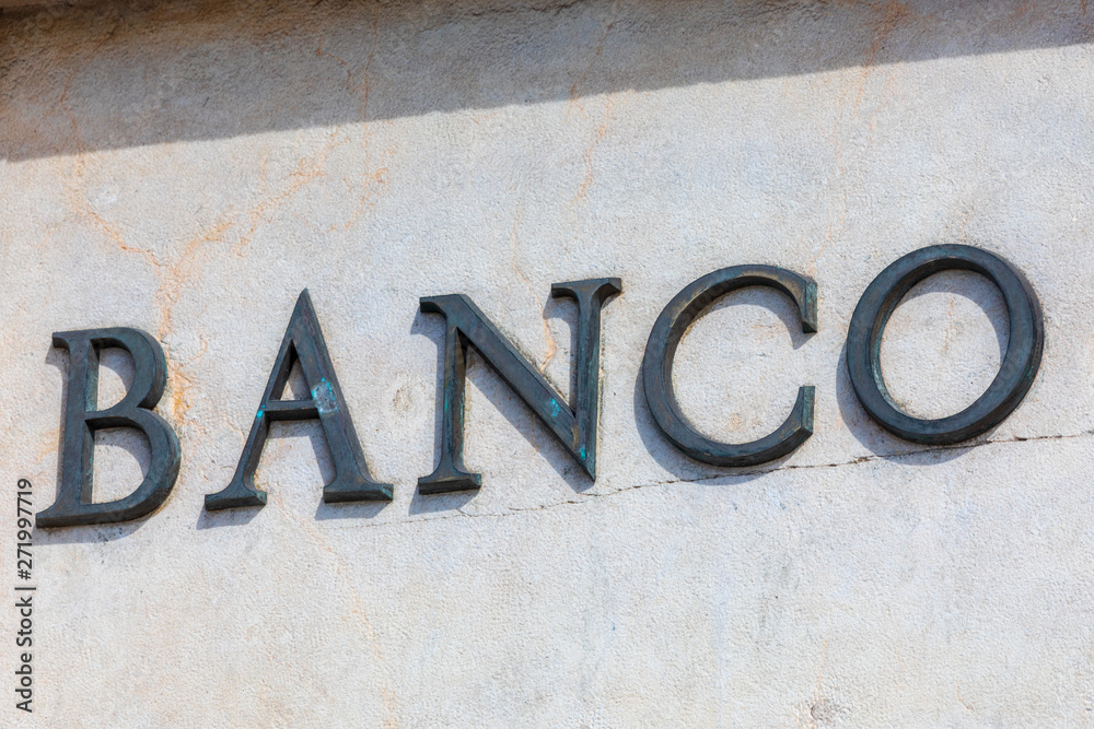 Bank word in Spanish. Metallic lettering. Bank word in Spanish. Metallic lettering.