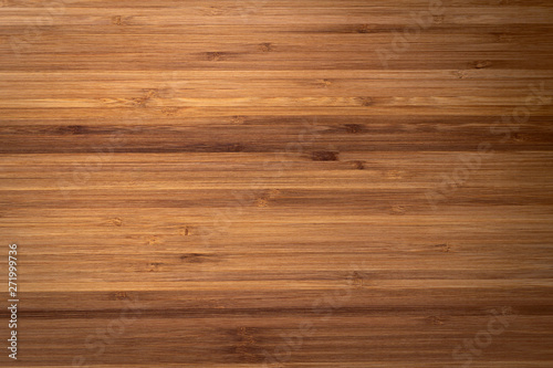 Top view of the wooden board. The texture of the wooden coating.