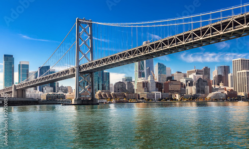 Downtown San Francisco and Oakland Bay Bridge on sunny day photo