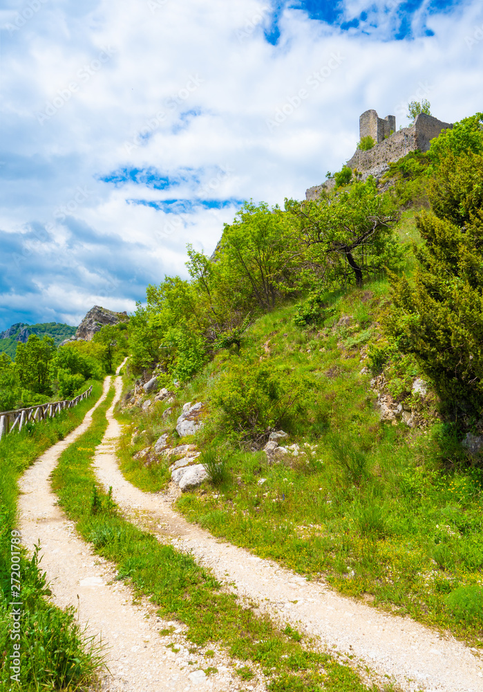 Cicolano (Italy) - The green mountain area of Salto Lake, Lazio region province of Rieti, with the ruins of medieval castle named Poggio Poponesco