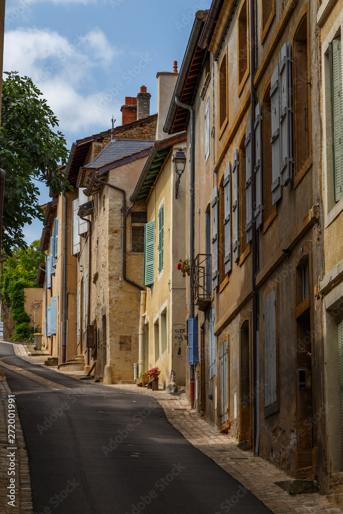 CLUNY / FRANCE - JULY 2015: Quiet street in the historic centre of Cluny town, France