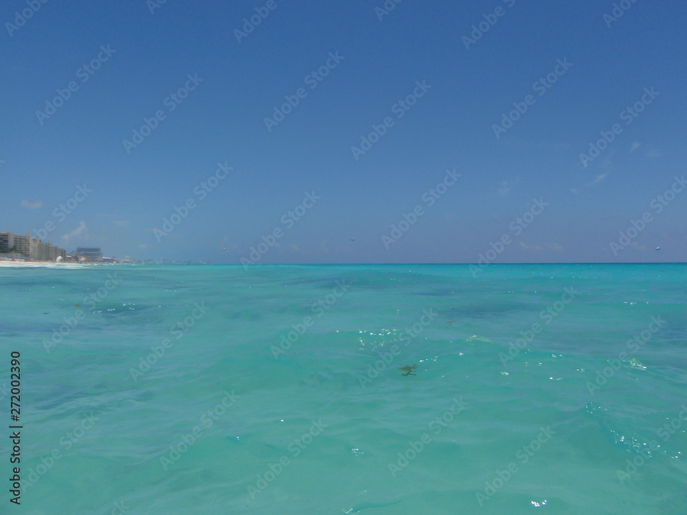 Playa Delfines in Cancun, Quintana Roo, Mexico. Blue caribbean sea. Playa Delfines in Cancun, Quintana Roo, Mexico. Blue caribbean sea.