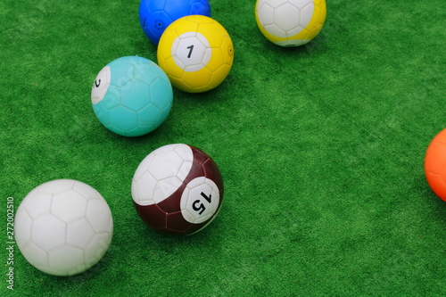 balls with numbers on a green field © Алексей Анисимов