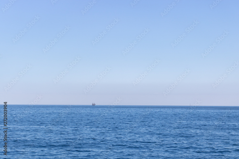 Seascape with sea horizon and almost clear deep blue sky Seascape with sea horizon and almost clear deep blue sky