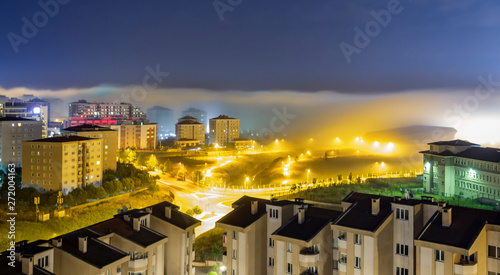 long exposure city when the fog comes under star light