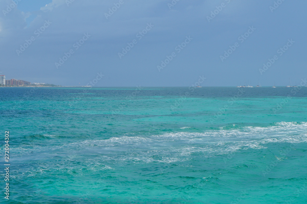 Blue Caribbean sea at Isla Mujeres in Quintana Roo, Mexico Blue Caribbean sea at Isla Mujeres in Quintana Roo, Mexico