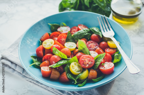 Tomatoes salad with basil