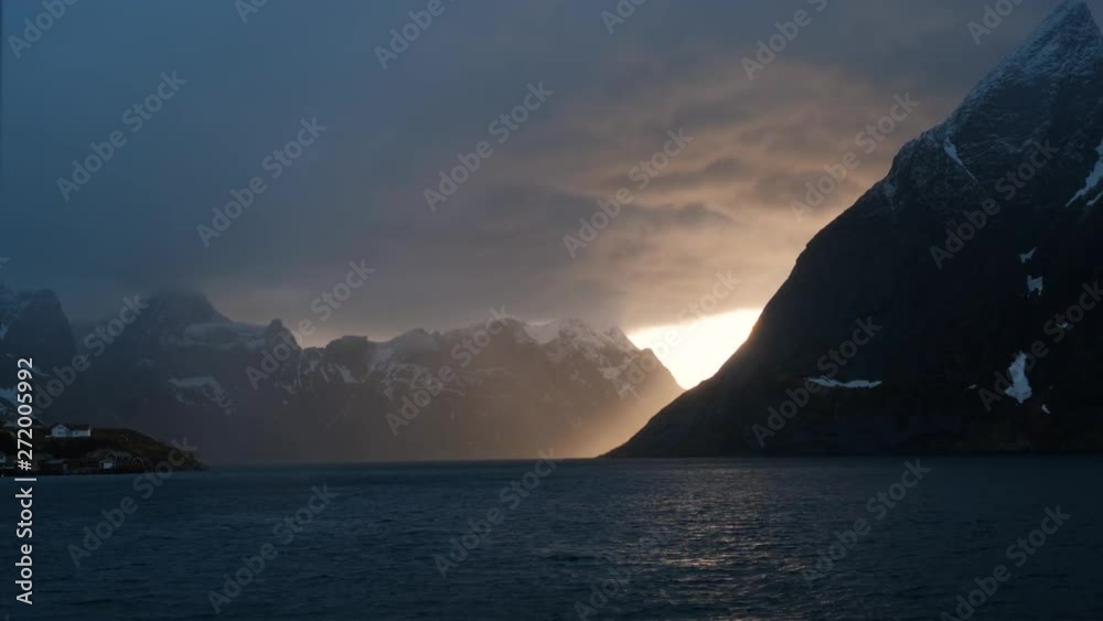 Sunset cloudy sky at the coastal of Reine and Hamnoy on Moskenesoya island, Lofoten Islands archipelag.