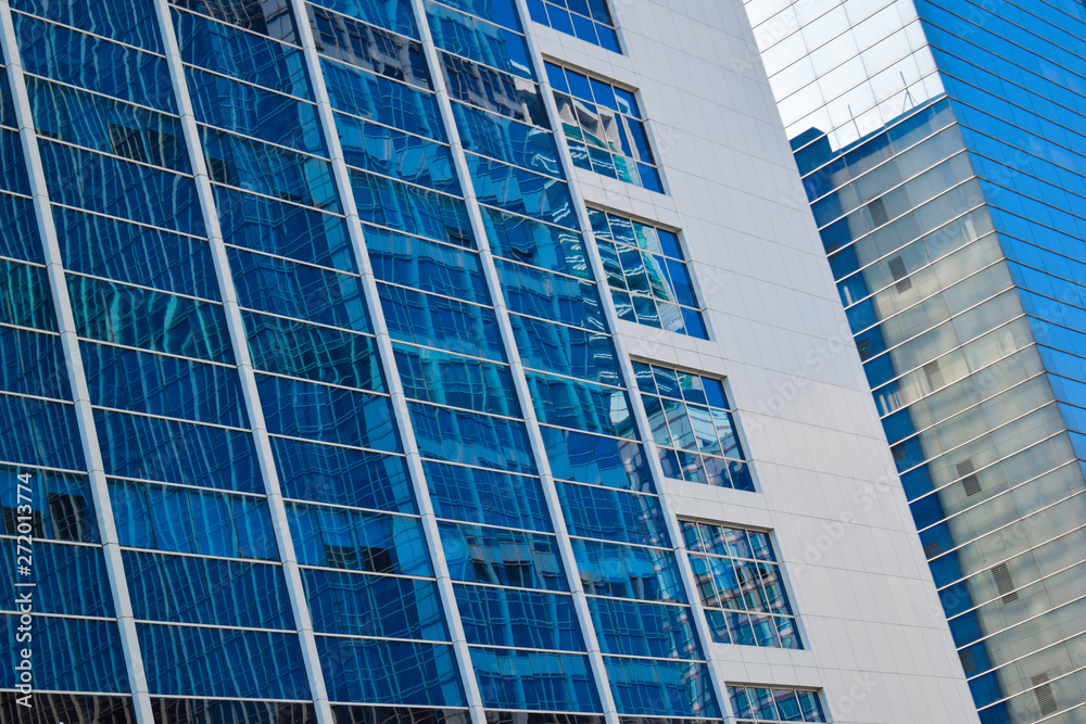 modern glass and steel office buildings low angle view at Jakarta, Indonesia modern glass and steel office buildings low angle view at Jakarta, Indonesia