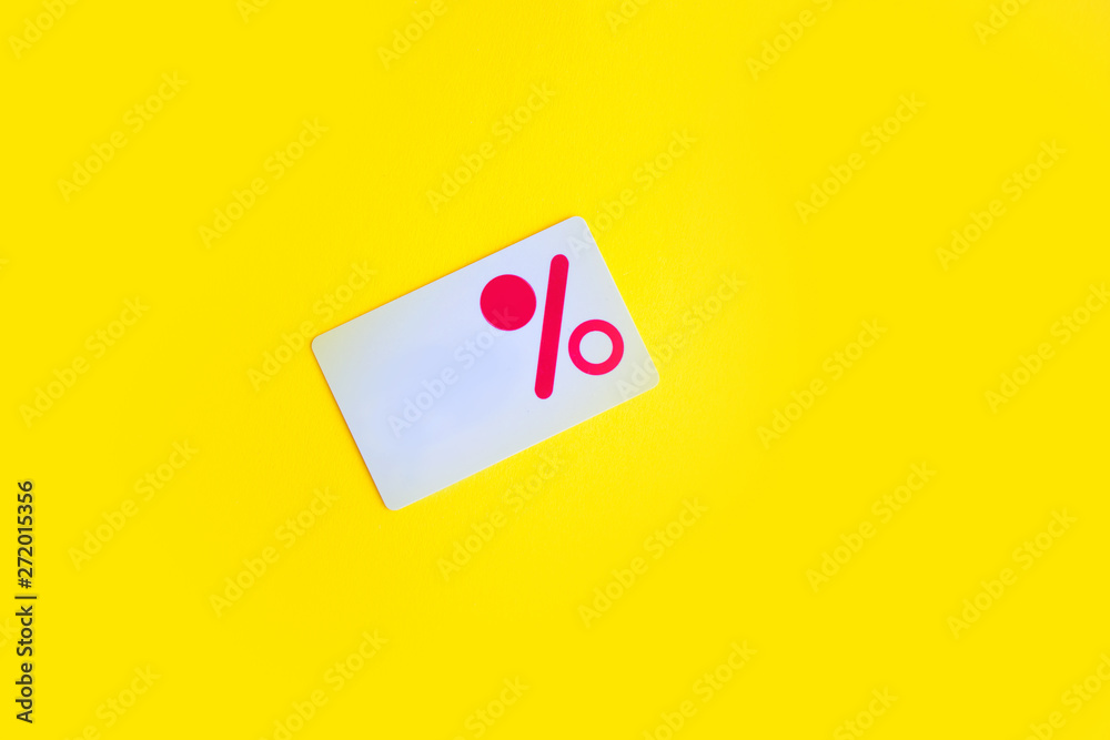 Discount card on yellow background Discount card on yellow background