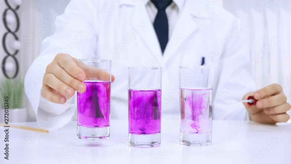 laboratory scientist performs experiments laboratory scientist performs experiments