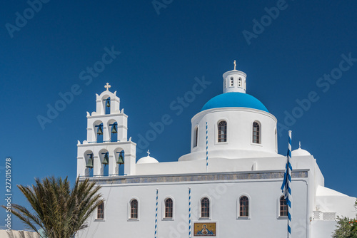 Traditional Greek Orthodox church in village of Oia on Santorini