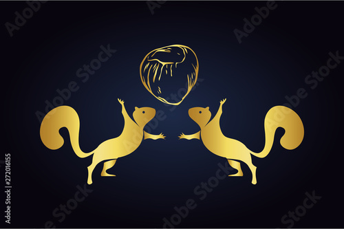 Isolated vector playing squirrels silhouettes and hazelnut on top. Logo of squirrels juggle with nut in golden color. Squirrels standing on hind legs with front legs to the top. 