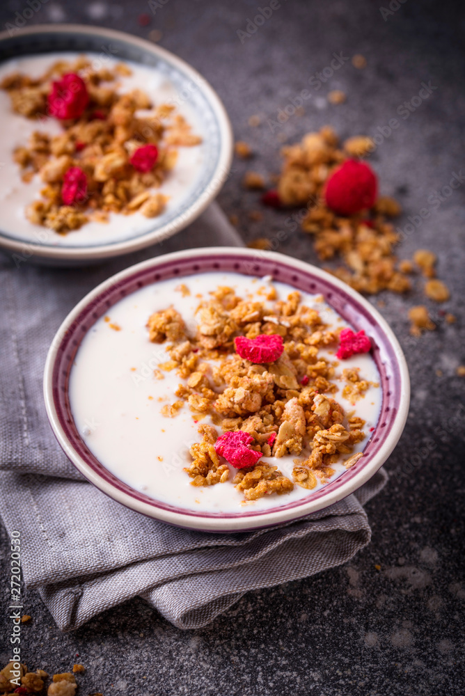 Granola with yogurt and dried raspberries Granola with yogurt and dried raspberries