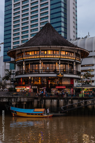 Boat trip on the Sarawak river by sunset and night