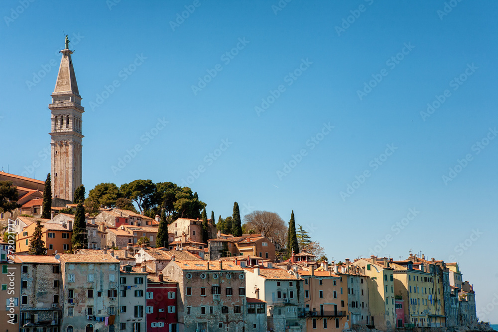 Rovinj city old town’s colorful houses and the  St. Euphemia Church’s 60 meters tall tower