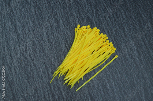 Collection of Yellow cable ties	 photo