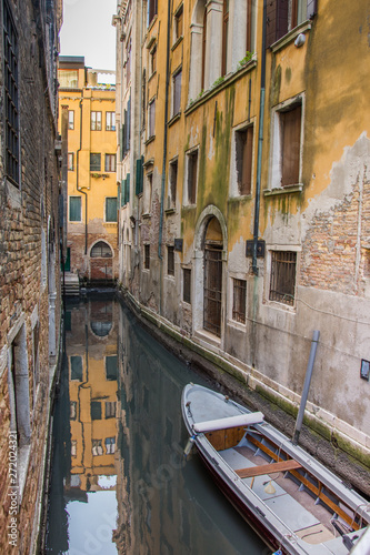 Venice canal  narrow navigation routes in Venice  march  2019