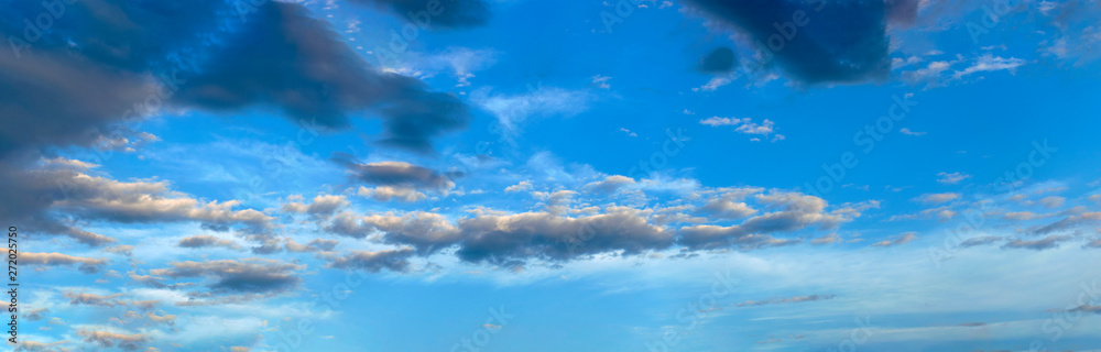 Blue sky and stormy clouds panorama