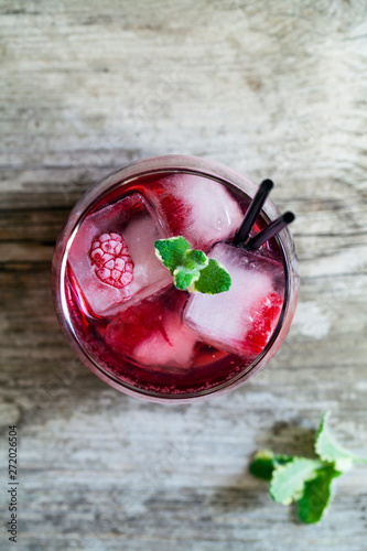 Refreshing raspberry cocktail with ice