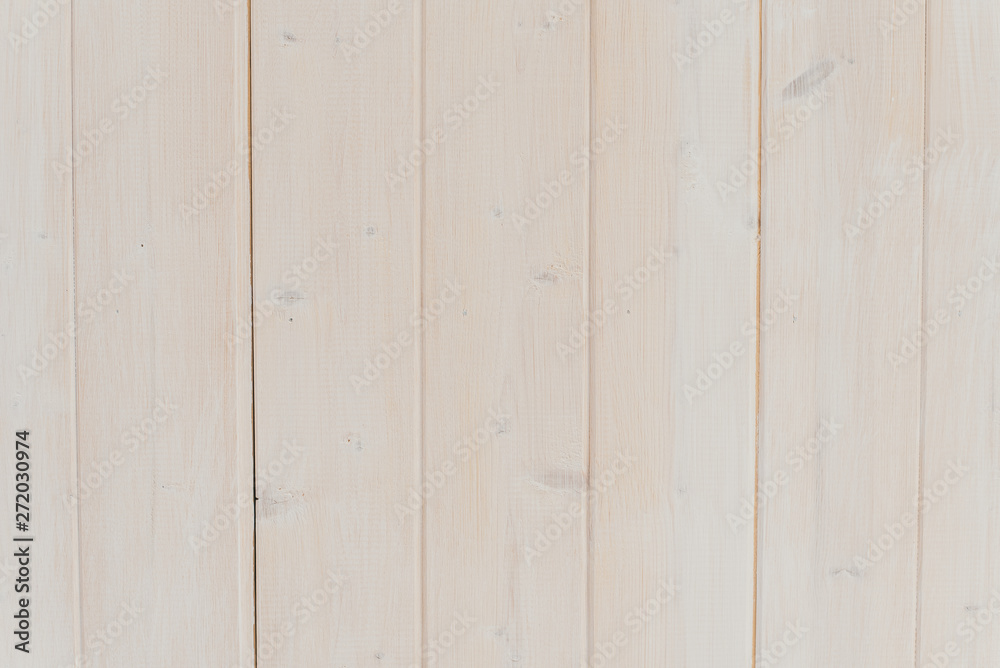 horizontal photo of vertical wooden boards. light beige wooden background. wooden texture. horizontal photo of vertical wooden boards. light beige wooden background. wooden texture.