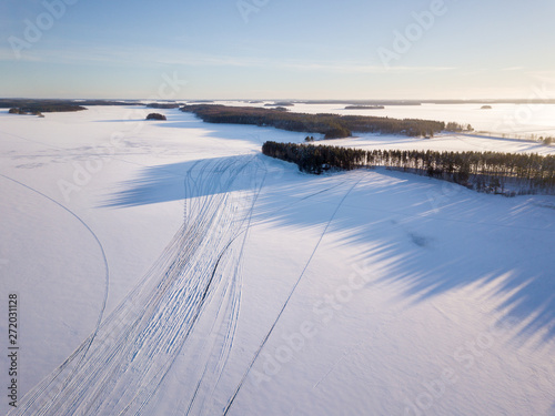 Snowmobile route on frozen lake