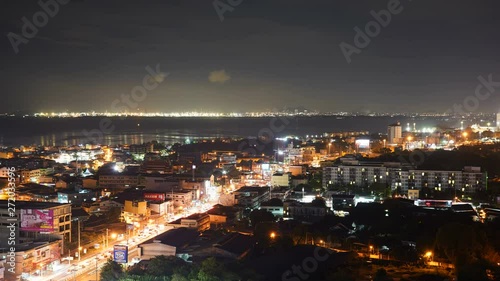 Wallpaper Mural locked aerial panoramic time-lapse shot with a view over Pattaya, Thailand at night with illuminated electric city lights, copy space urban coastal area, tourist destination Asian growing metro area Torontodigital.ca