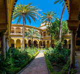 A patio from the traditional Andalusian Palacio de las Duenas located in Sevilla, Spain