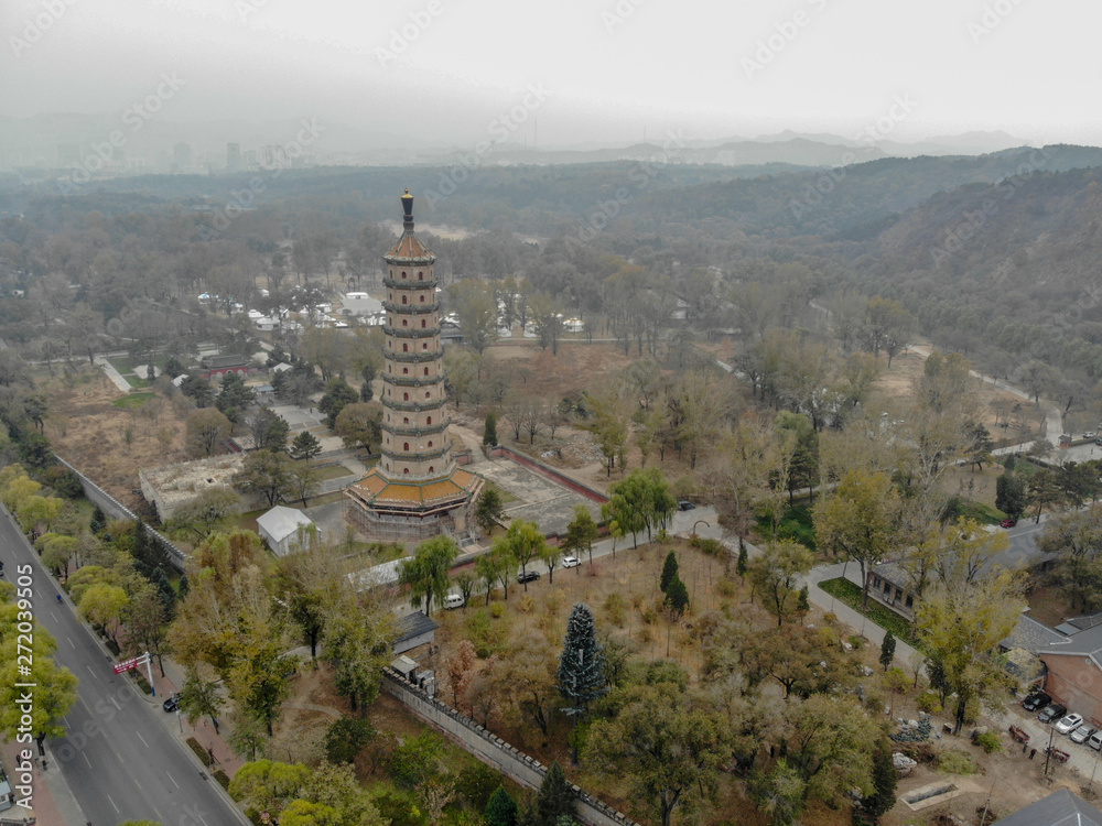 Fototapeta premium Aerial view of tower pavilion inside the Imperial Summer Palace of The Mountain Resort in Chengde. China. Chinese ancient building. UNESCO World Heritage. Ancient Chinese architecture.