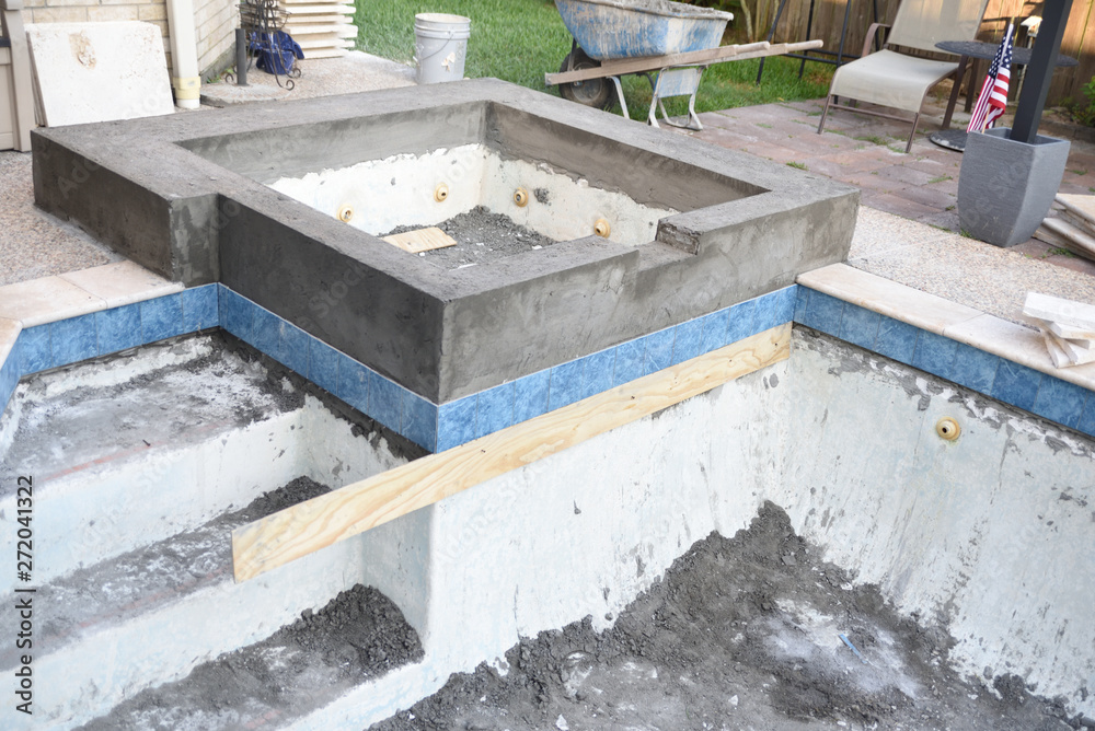 swimming pool hot tub remodel with new concrete and tile