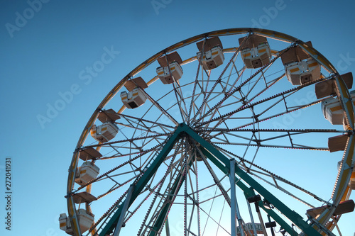 Aged vintage backlit Ferris wheel