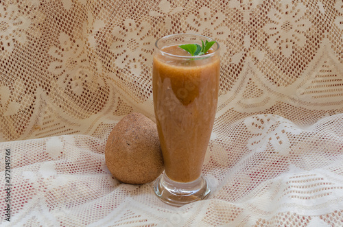 Sapodilla Juice and Fruit Side View photo