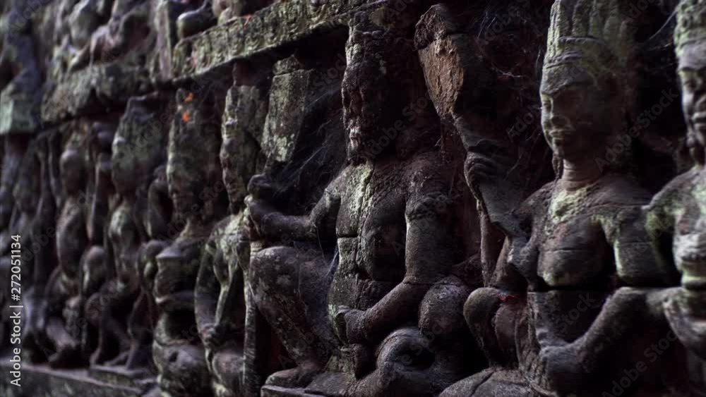 custom made wallpaper toronto digitalClose view of detailed and cracked by time bas-reliefs of the Leper King terrace located in the northwest corner of the Royal Square of Angkor Thom, Cambodia.