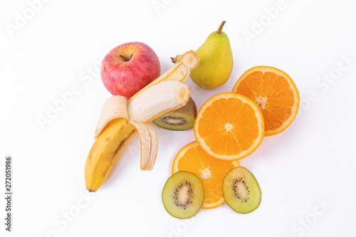 top view of tropical fruits. Orange and kiwi in slices. white background