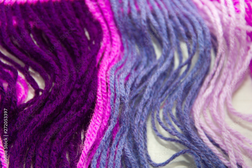 Fototapeta premium textured background of colorful woolen threads