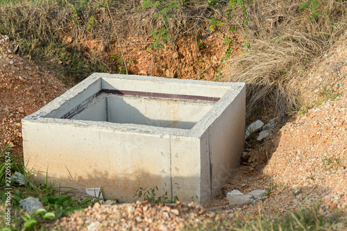 Concrete construction tube pipe. Building a road sewer drain system. Sewer construction. Build a road With concrete. sanitary sewer drainage system development . Sewer construction site.