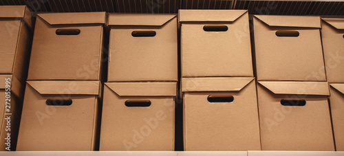 Stack of cardboard. Recycling of materials. Eco-friendly packaging. Cardboard carob